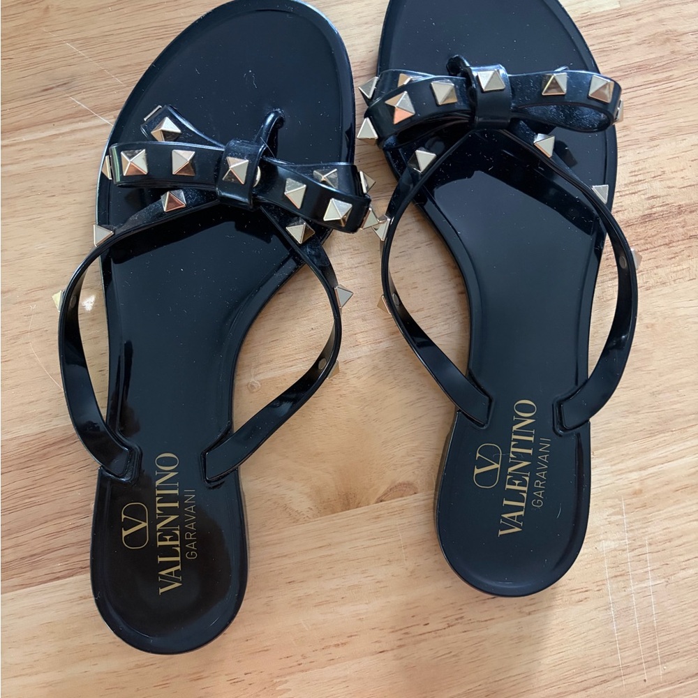 Valentino Garavani Black Jelly Bow Sandals with Gold Studs